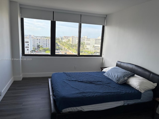 3589 S Ocean Blvd Unit 914, South Palm Beach, FL 33480 - bedroom featuring a city view and dark wood finished floors