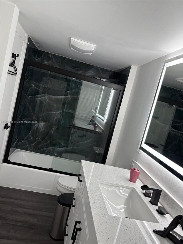 3589 S Ocean Blvd Unit 914, South Palm Beach, FL 33480 - bathroom featuring vanity and enclosed tub / shower combo