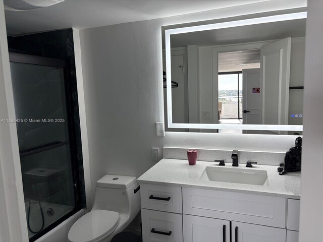 3589 S Ocean Blvd Unit 914, South Palm Beach, FL 33480 - full bath with vanity and shower / bath combination with glass door