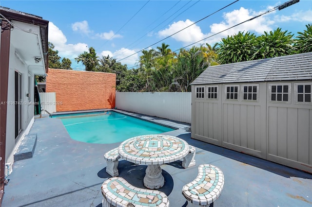 2220 SW 12th St, Miami, FL 33135 - view of swimming pool featuring a fenced backyard and a patio