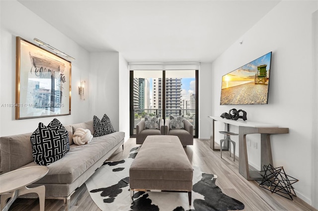 801 S Miami Ave Unit 1210, Miami, FL 33130 - living area featuring expansive windows and wood finished floors