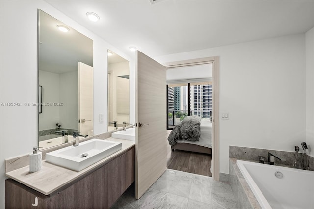 801 S Miami Ave Unit 1210, Miami, FL 33130 - full bath featuring a garden tub, vanity, and ensuite bath