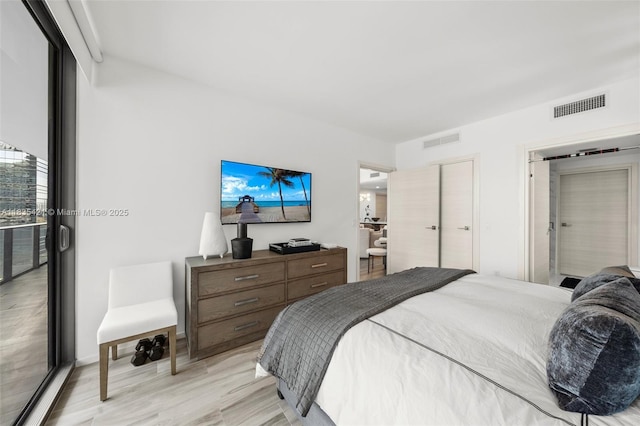 801 S Miami Ave Unit 1210, Miami, FL 33130 - bedroom featuring light wood-type flooring