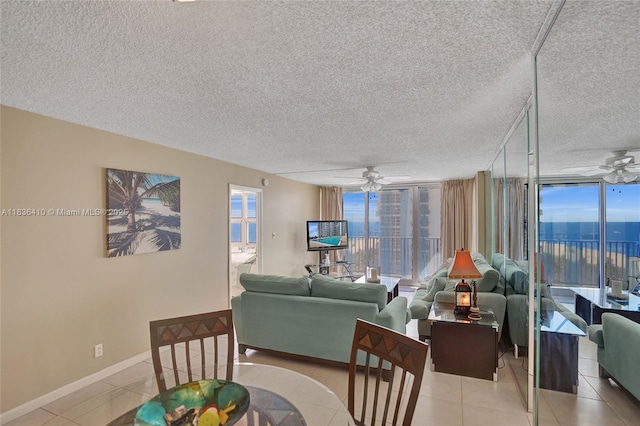 531 N Ocean Blvd Unit 1108, Pompano Beach, FL 33062 - dining space with ceiling fan, a textured ceiling, and light tile patterned floors