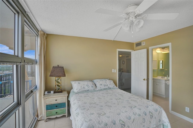 531 N Ocean Blvd Unit 1108, Pompano Beach, FL 33062 - bedroom featuring light tile patterned flooring, a textured ceiling, ceiling fan, connected bathroom, and access to outside