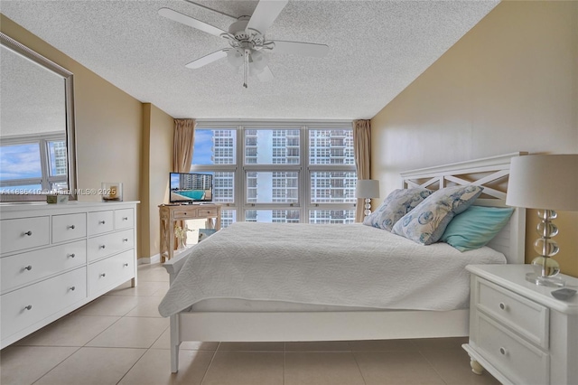 531 N Ocean Blvd Unit 1108, Pompano Beach, FL 33062 - bedroom featuring a textured ceiling, ceiling fan, and light tile patterned floors