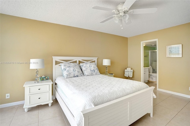 531 N Ocean Blvd Unit 1108, Pompano Beach, FL 33062 - bedroom with light tile patterned floors, a ceiling fan, a textured ceiling, and ensuite bathroom