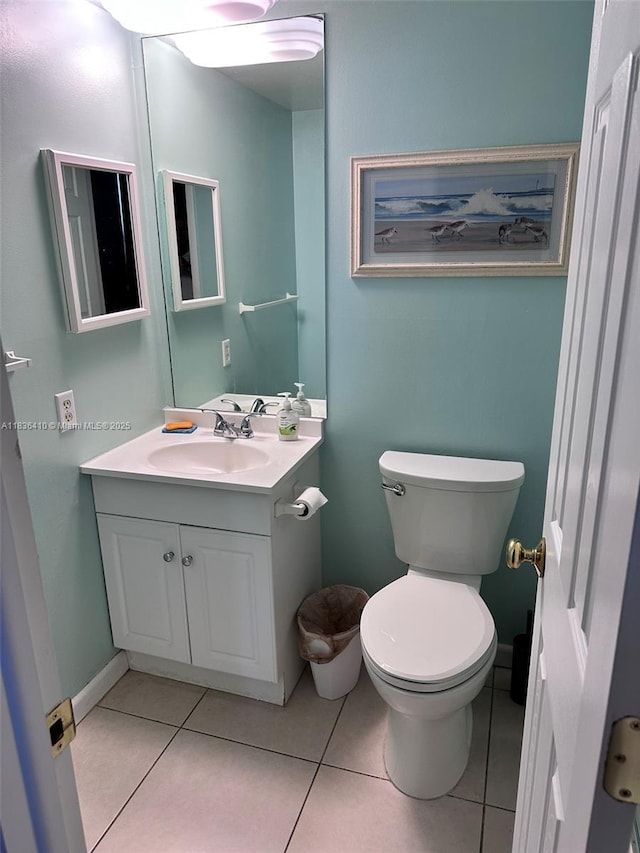 531 N Ocean Blvd Unit 1108, Pompano Beach, FL 33062 - half bathroom with vanity and tile patterned flooring