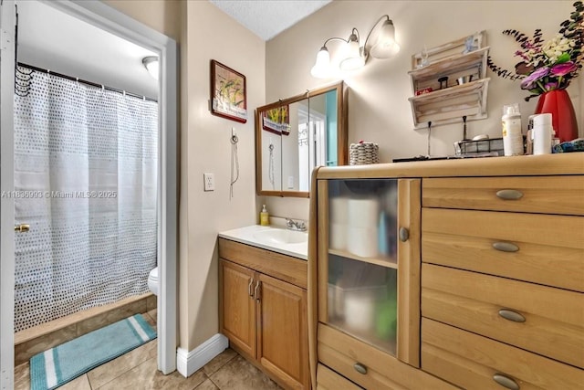 6555 W Broward Blvd Unit 300, Plantation, FL 33317 - bathroom with vanity, tile patterned floors, and curtained shower