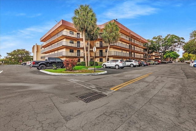 6555 W Broward Blvd Unit 300, Plantation, FL 33317 - view of property with uncovered parking
