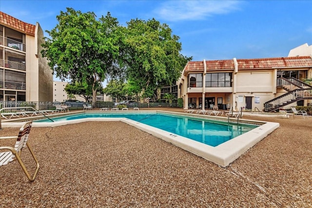6555 W Broward Blvd Unit 300, Plantation, FL 33317 - community pool with a patio area