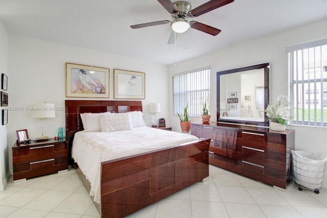 2524 NW 104th Ave Unit 101, Sunrise, FL 33322 - bedroom featuring multiple windows, light tile patterned floors, and ceiling fan