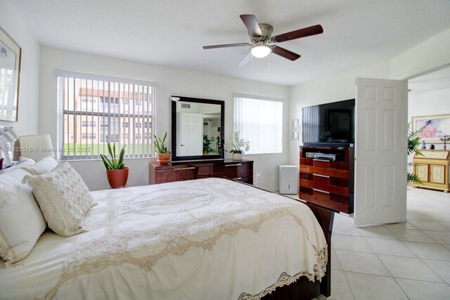2524 NW 104th Ave Unit 101, Sunrise, FL 33322 - bedroom featuring tile patterned floors and a ceiling fan