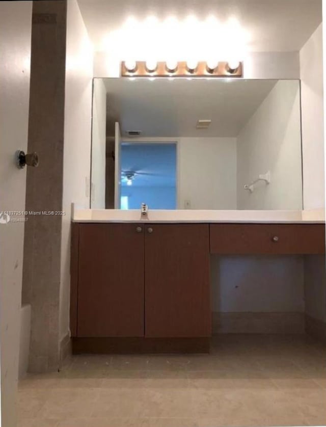4653 NW 97 Unit 21, Doral, FL 33178 - bathroom with vanity and tile patterned floors