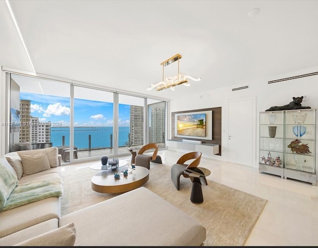 300 Biscayne Boulevard Way Unit 2703, Miami, FL 33131 - living room with a chandelier and a wall of windows