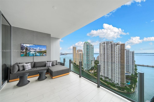 300 Biscayne Boulevard Way Unit 2703, Miami, FL 33131 - balcony featuring a water view and an outdoor living space