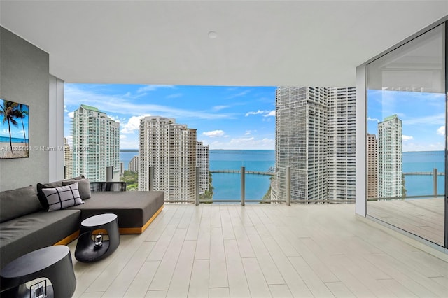 300 Biscayne Boulevard Way Unit 2703, Miami, FL 33131 - patio / terrace with a water view and an outdoor hangout area
