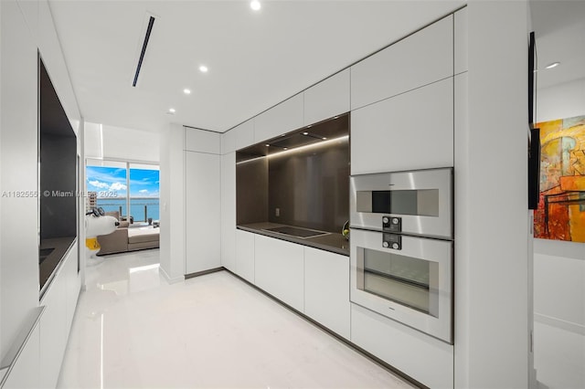 300 Biscayne Boulevard Way Unit 2703, Miami, FL 33131 - unfurnished living room featuring recessed lighting