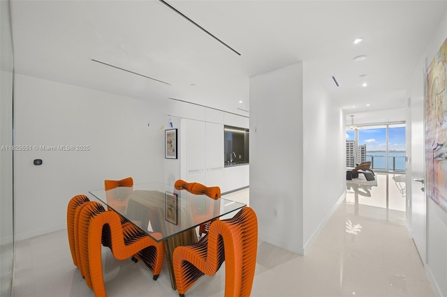 300 Biscayne Boulevard Way Unit 2703, Miami, FL 33131 - dining area featuring baseboards and recessed lighting