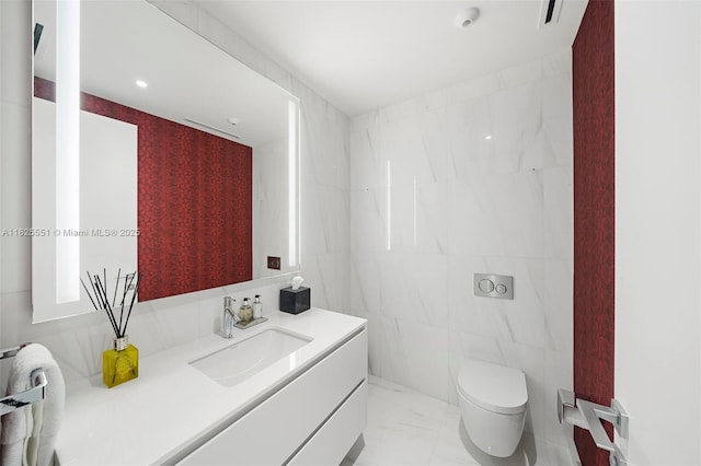 300 Biscayne Boulevard Way Unit 2703, Miami, FL 33131 - bathroom featuring vanity, tile walls, and marble finish flooring