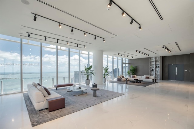 300 Biscayne Boulevard Way Unit 2703, Miami, FL 33131 - common area featuring a wall of windows and a water view