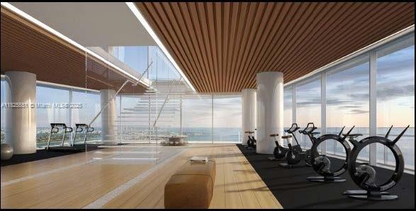 300 Biscayne Boulevard Way Unit 2703, Miami, FL 33131 - exercise room featuring expansive windows