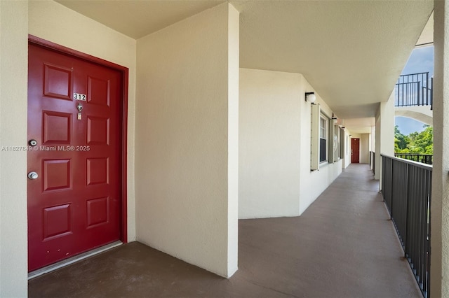 1000 SW 128th Ter Unit 312V, Pembroke Pines, FL 33027 - doorway to property with stucco siding and a balcony