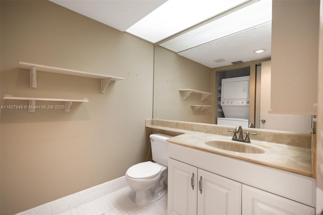 1000 SW 128th Ter Unit 312V, Pembroke Pines, FL 33027 - half bath with stacked washer / drying machine, vanity, tile patterned floors, and recessed lighting