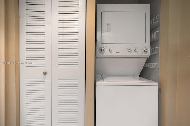 1000 SW 128th Ter Unit 312V, Pembroke Pines, FL 33027 - laundry area with stacked washing machine and dryer