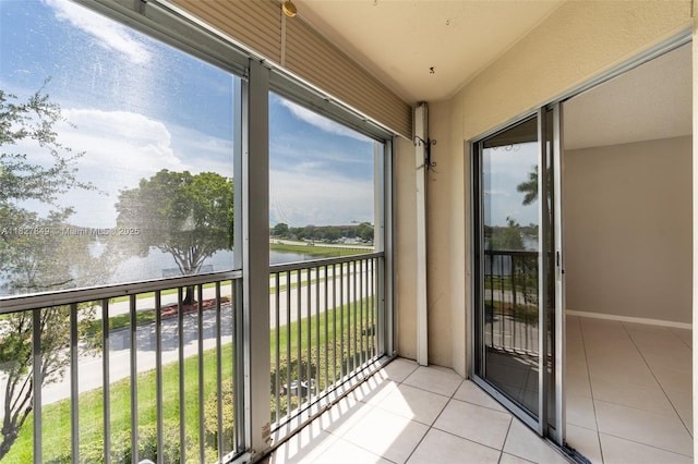 1000 SW 128th Ter Unit 312V, Pembroke Pines, FL 33027 - unfurnished sunroom with a water view and healthy amount of natural light