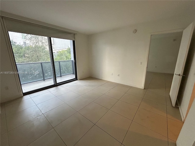 31 SE 6th St Unit 407, Miami, FL 33131 - unfurnished room featuring light tile patterned floors