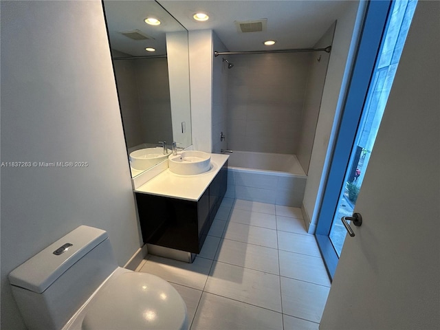 31 SE 6th St Unit 407, Miami, FL 33131 - full bathroom featuring tile patterned flooring, double vanity, shower / tub combination, and recessed lighting