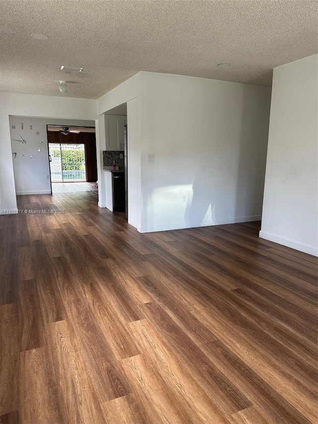 6547 SW 35th St, Miami, FL 33155 - unfurnished room with a textured ceiling and dark wood-type flooring