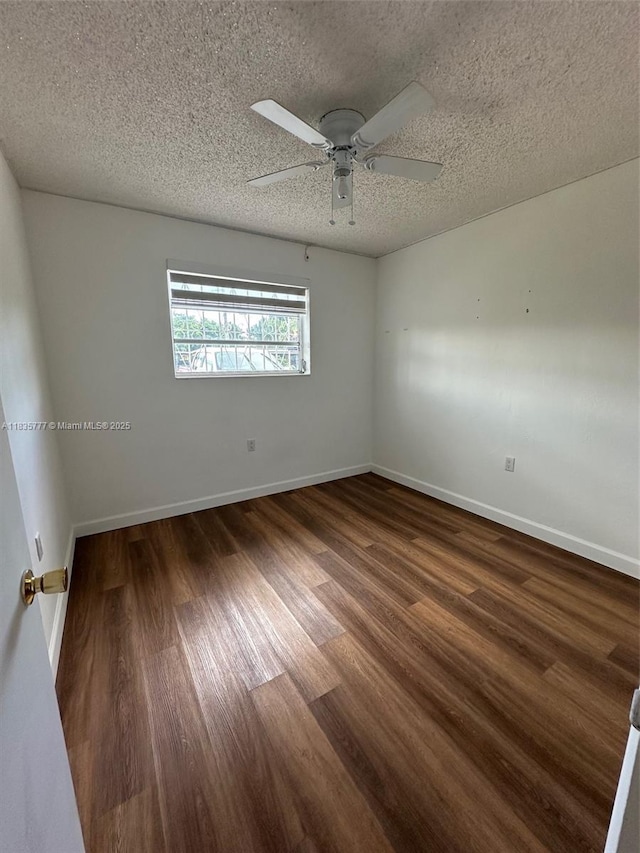 6547 SW 35th St, Miami, FL 33155 - empty room with a textured ceiling, wood finished floors, and ceiling fan