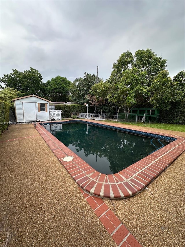 6547 SW 35th St, Miami, FL 33155 - view of pool with a storage unit