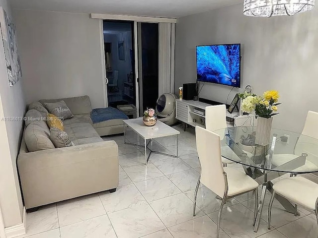 800 N Miami Ave Unit E-707, Miami, FL 33136 - living room with light marble finish flooring and a chandelier