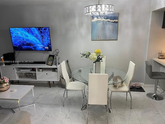 800 N Miami Ave Unit E-707, Miami, FL 33136 - dining room with marble finish flooring and a chandelier