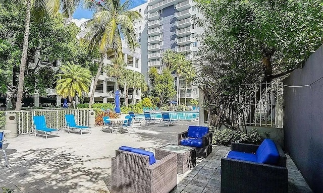 800 N Miami Ave Unit E-707, Miami, FL 33136 - view of patio / terrace featuring an outdoor living space and a community pool