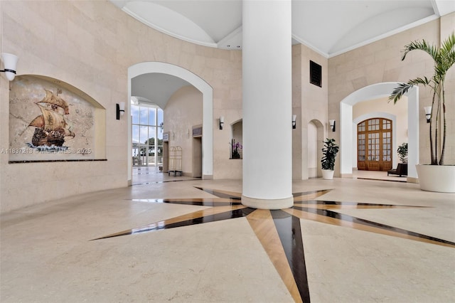 1643 Brickell Ave Unit 1406, Miami, FL 33129 - lobby featuring a towering ceiling and crown molding