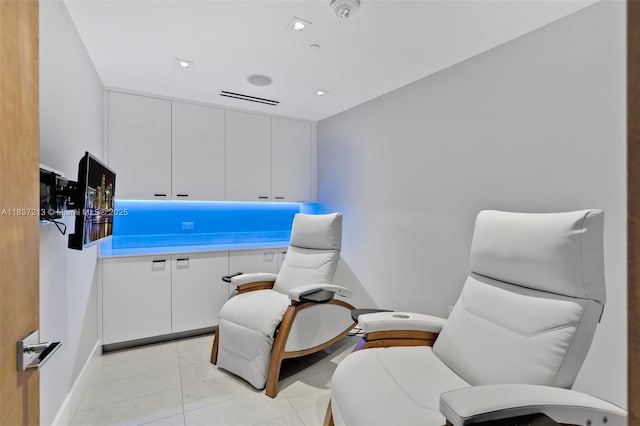 1643 Brickell Ave Unit 1406, Miami, FL 33129 - sitting room with light tile patterned floors and baseboards