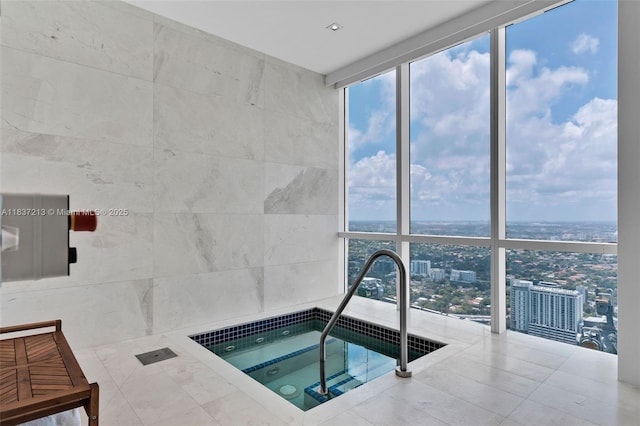 1643 Brickell Ave Unit 1406, Miami, FL 33129 - view of swimming pool with an in-ground hot tub and a view of city