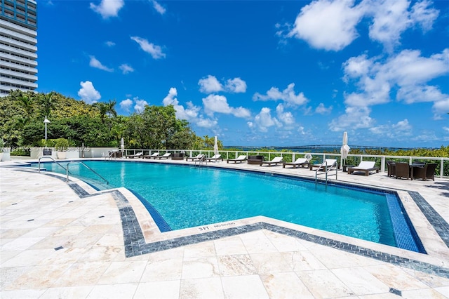 1643 Brickell Ave Unit 1406, Miami, FL 33129 - community pool featuring a patio