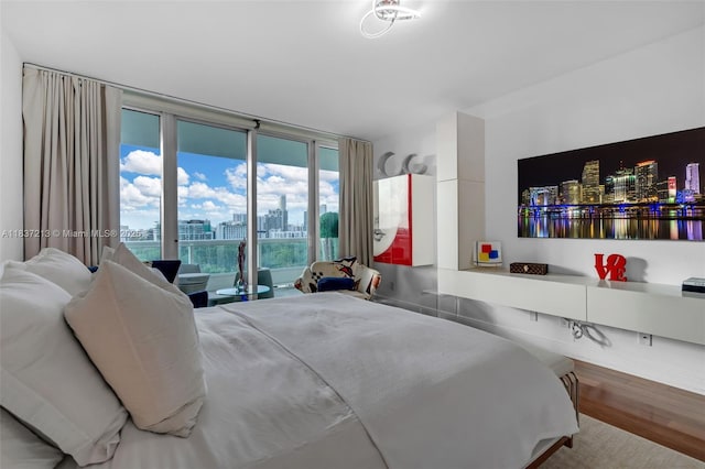 1643 Brickell Ave Unit 1406, Miami, FL 33129 - bedroom with wood finished floors