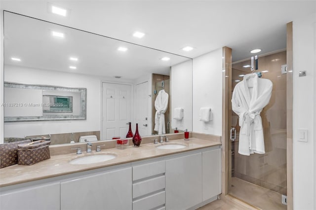 1643 Brickell Ave Unit 1406, Miami, FL 33129 - full bath featuring double vanity, a stall shower, and recessed lighting