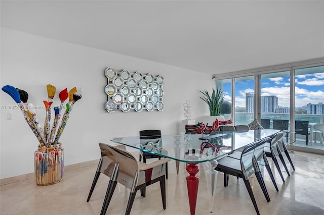 1643 Brickell Ave Unit 1406, Miami, FL 33129 - dining space featuring a view of city and finished concrete floors
