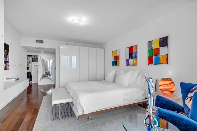 1643 Brickell Ave Unit 1406, Miami, FL 33129 - bedroom with wood finished floors