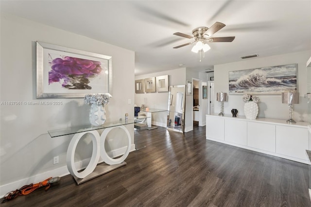 3201 NW 4th Ter Unit 80, Pompano Beach, FL 33064 - unfurnished dining area with dark wood-style flooring and a ceiling fan
