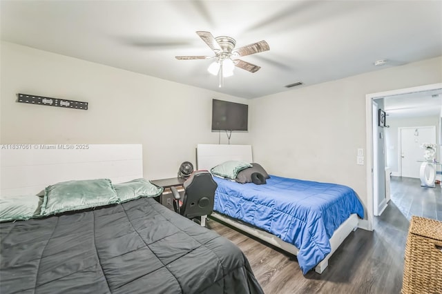 3201 NW 4th Ter Unit 80, Pompano Beach, FL 33064 - bedroom with wood finished floors and ceiling fan
