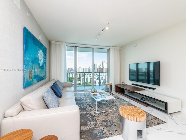 300 Sunny Isles Blvd Unit 5-1605, Sunny Isles Beach, FL 33160 - living area with a wall of windows and marble finish floors