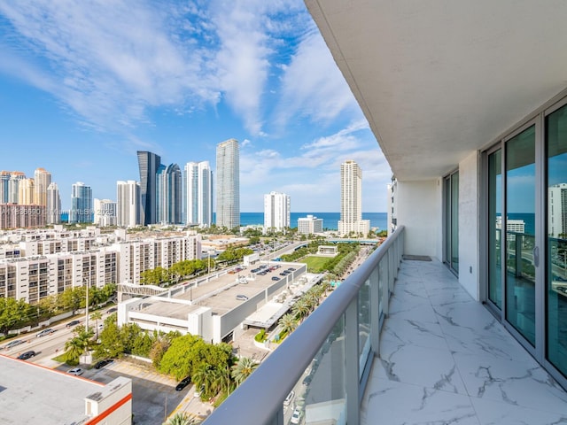 300 Sunny Isles Blvd Unit 5-1605, Sunny Isles Beach, FL 33160 - balcony featuring a skyline view and a water view